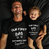 Man and child wearing matching shirts celebrating their first Father's Day together.